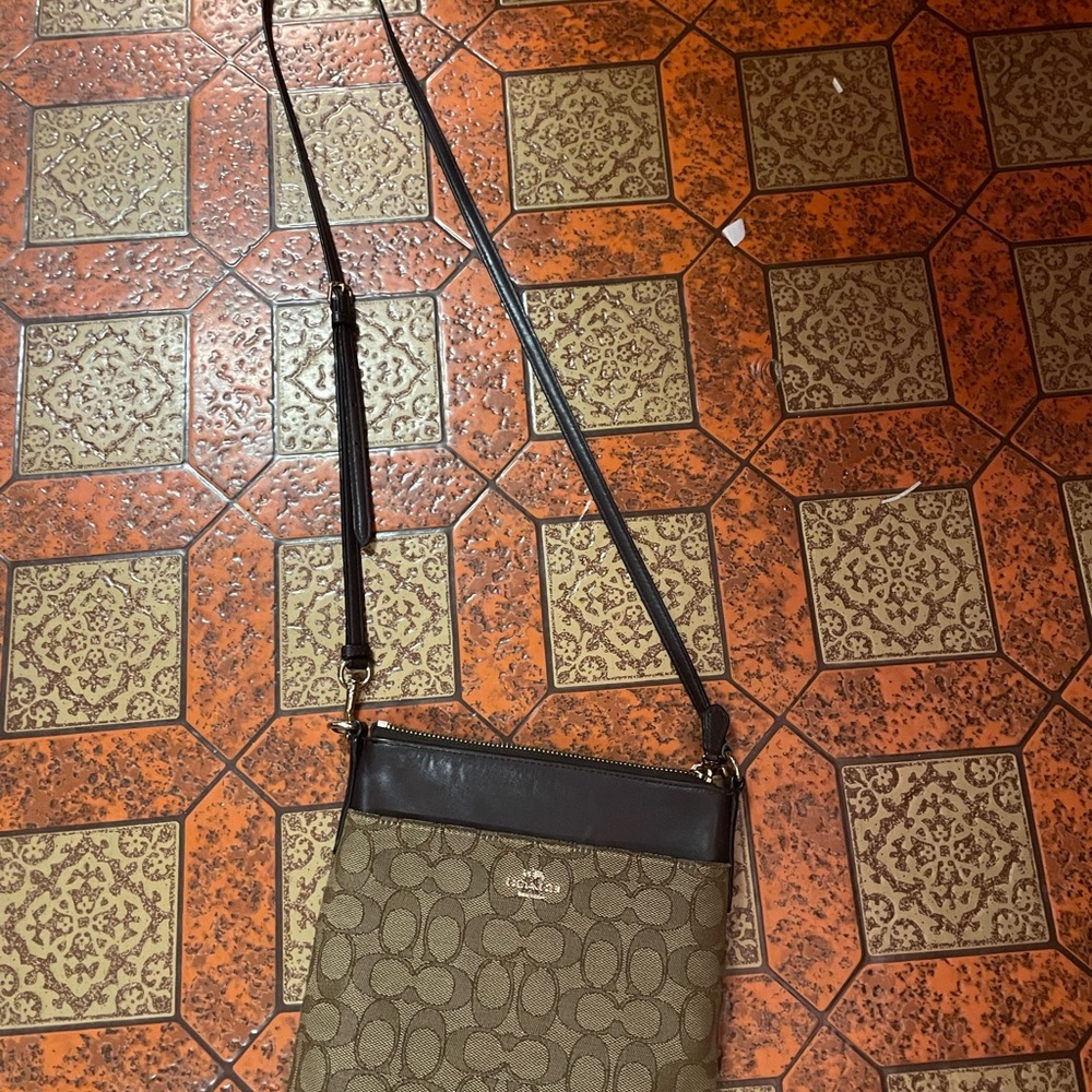 A coach original style color crossbody bag